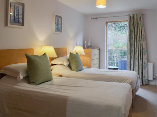 Ένα ή περισσότερα κρεβάτια σε δωμάτιο στο North Bay Sands Apartment 2- Uk2630