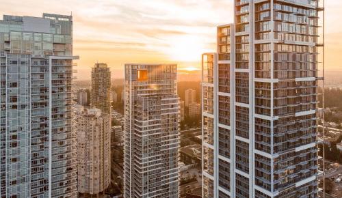 a view of a city with tall buildings at Pacific Sweet Place @Metro in Burnaby