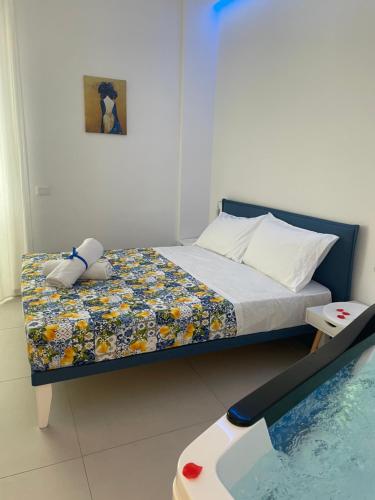 Ένα ή περισσότερα κρεβάτια σε δωμάτιο στο Brezza di Stabia Rooms
