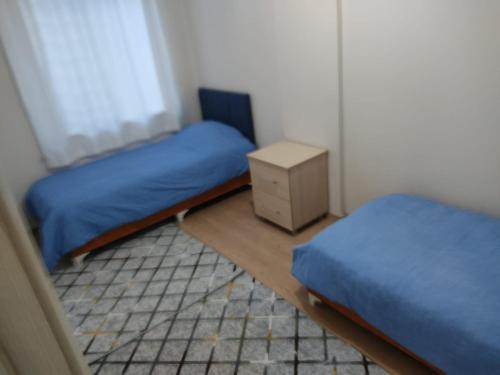Postel nebo postele na pokoji v ubytování Family Apatment Cheap Vacation House Home - BE MY GUEST