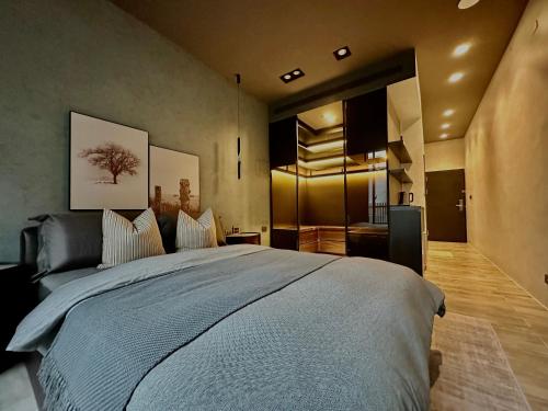 Ein Bett oder Betten in einem Zimmer der Unterkunft Here Hotel 宅這兒私宅-屏市B宅
