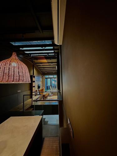 Ein Bett oder Betten in einem Zimmer der Unterkunft Here Hotel 宅這兒私宅-屏市B宅