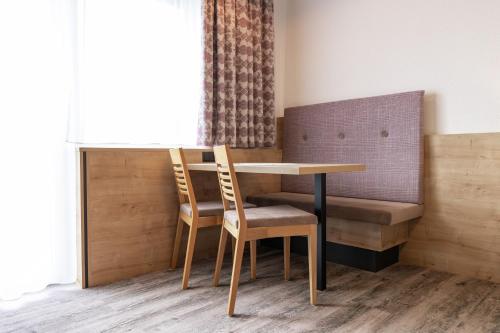 Coin salon dans l'établissement Das Aparthotel Olympia Tirol