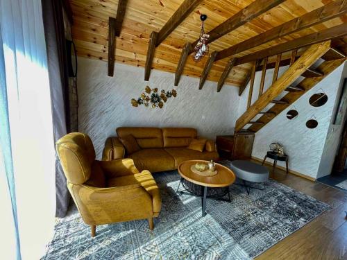 Coin salon dans l'établissement LUX VILA MOTICKI GAJ