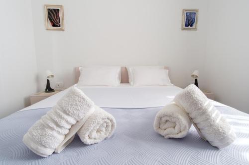 Ένα ή περισσότερα κρεβάτια σε δωμάτιο στο Apartments Grape