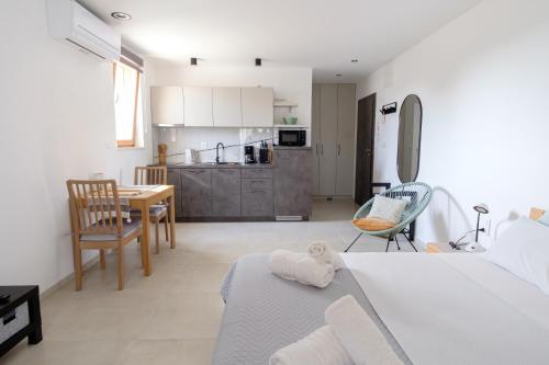 Η κουζίνα ή μικρή κουζίνα στο Apartments Grape