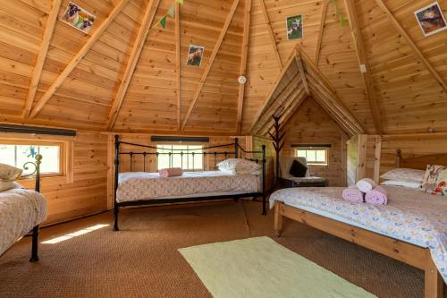 Ένα ή περισσότερα κρεβάτια σε δωμάτιο στο Dartmoor Eco-Pod - Oak Tree Lane