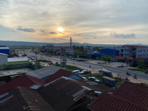 a view of a city with the sun in the sky at Chhay Ing Guesthouse 