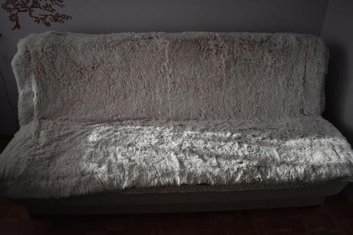 En eller flere senge i et værelse på PAVIN Apartment