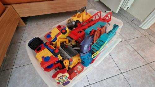 a toy train and cars in a container at Modern Sea Villa in Leptokaria in Leptokaria