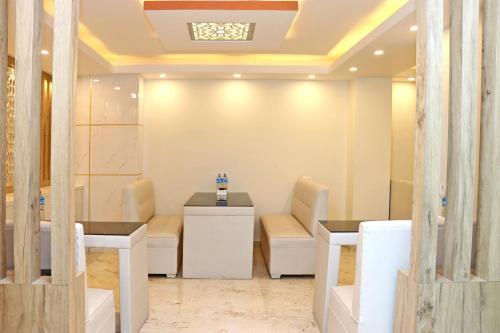 a salon with two chairs and a waiting room at Hotel Nilakantha Pvt. Ltd in Kathmandu