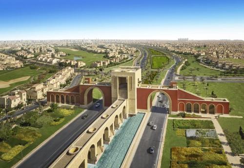 una vista aérea de una ciudad con una autopista en شقه مفروش الترا سوبر لوكس مدينتى, en Madinaty