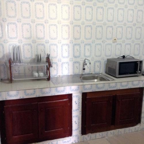 Η κουζίνα ή μικρή κουζίνα στο Bolo Residence Douala