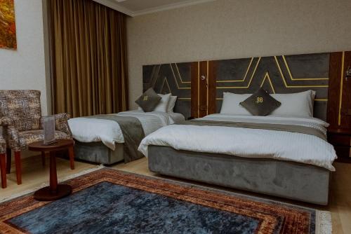 Ein Bett oder Betten in einem Zimmer der Unterkunft Sofia Hotel
