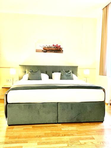 a bedroom with a large bed with at Home Sweet Apartments - A cozy welcome in Vienna