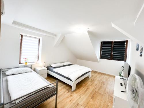 Llit o llits en una habitació de 866 Plagwitz Apartment (Kulturviertel)