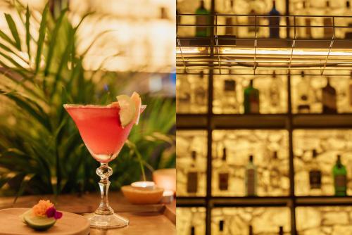 a drink in a glass sitting on top of a table at SOLO PALACIO - Boutique Hotel & Spa in Llanuces