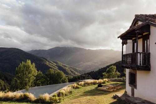 a house with a view of the mountains at SOLO PALACIO - Boutique Hotel & Spa 