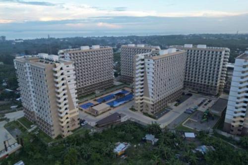 an aerial view of a city with tall buildings at Ohana Suites Lapu-Lapu City Condo Staycation Near Mactan International Airport in Lapu Lapu City