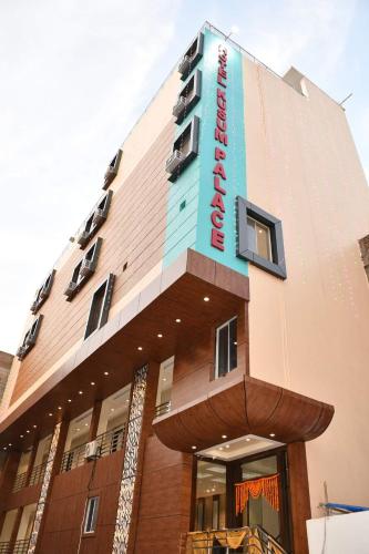 a rendering of the front of a hotel at Hotel Kusum Palace in Gaya