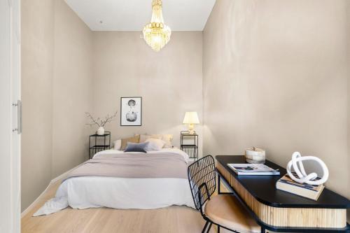 Säng eller sängar i ett rum på Unique Oslo/Vika Apartment