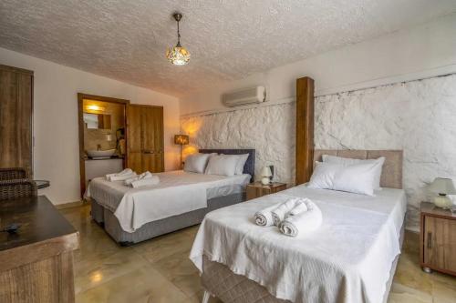 Katil atau katil-katil dalam bilik di Belong Otel