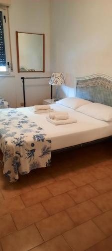 Ліжко або ліжка в номері Casa Quercia