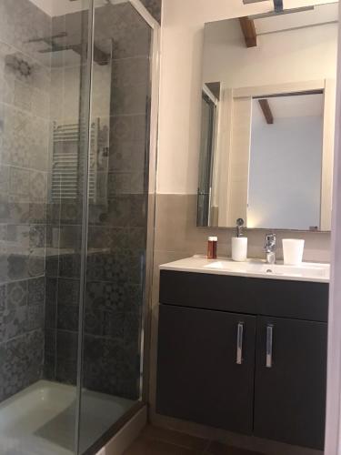 a bathroom with a shower and a sink at Monis Hogar in Arzachena