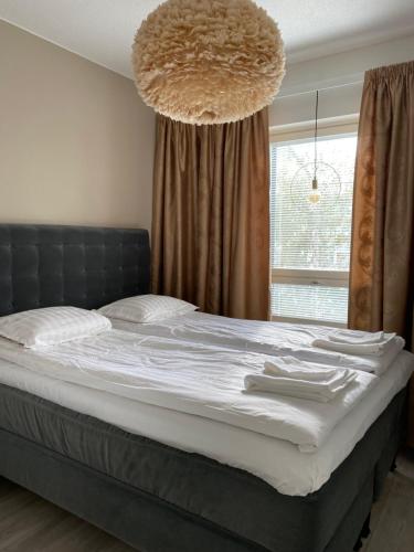 Llit o llits en una habitació de Apartment Leppä Rovaniemi