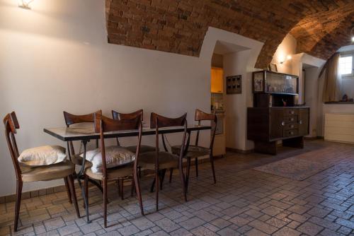 a dining room with a table and chairs at CASA DI LUCA in Stezzano