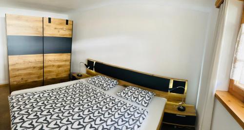 Ein Bett oder Betten in einem Zimmer der Unterkunft Mountain Getaway Sedrun