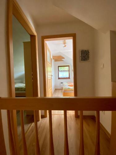 a view of a hallway from the stairs of a house at Apartmán Donovaly Mišuty 586 in Donovaly
