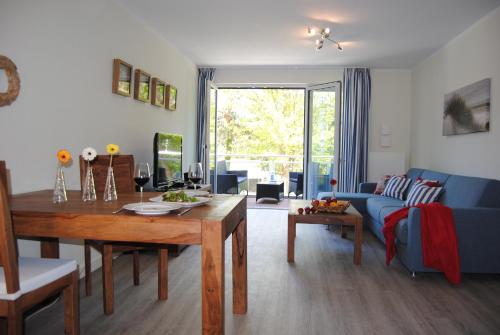 Posezení v ubytování Ferienwohnung Blaubärstrand