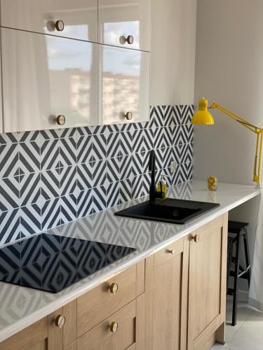 Dapur atau dapur kecil di RUBY Apartment- self checkin 24h