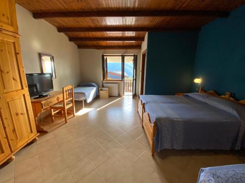 Ένα ή περισσότερα κρεβάτια σε δωμάτιο στο Albergo Nazionale