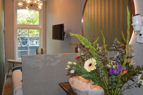 TV a/nebo společenská místnost v ubytování The IF Boutique hotel