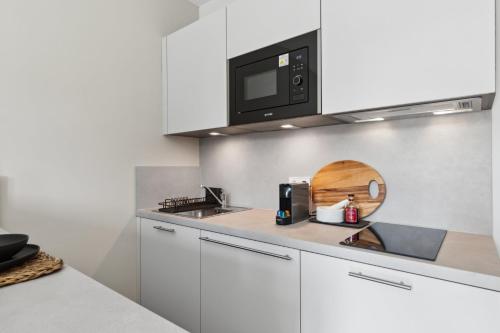 Una cocina o cocineta en Home and CoLiving Bonn I Aparthotel