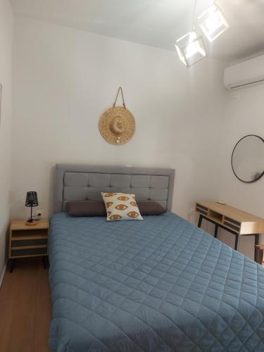 Postel nebo postele na pokoji v ubytování Athinais Karystos