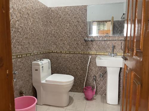 Een badkamer bij Umda Hotel Galaxy