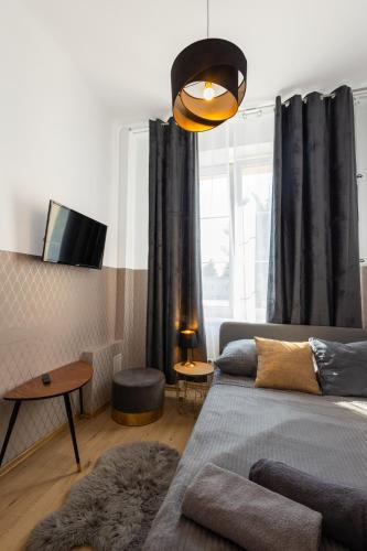 Posteľ alebo postele v izbe v ubytovaní ClickTheFlat Aleje Niepodległości Center Apart Rooms