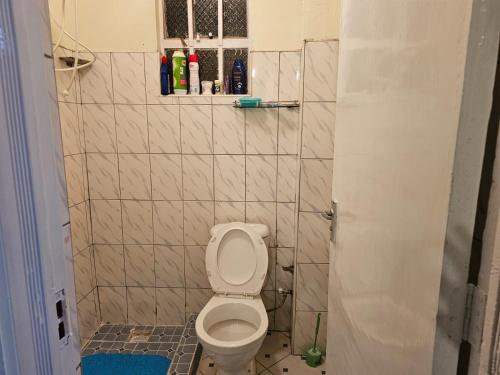 Kúpeľňa v ubytovaní West Homestays Kodi2518