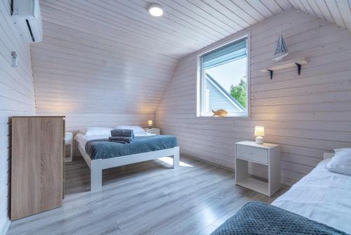 Tempat tidur dalam kamar di Morskie Opowieści