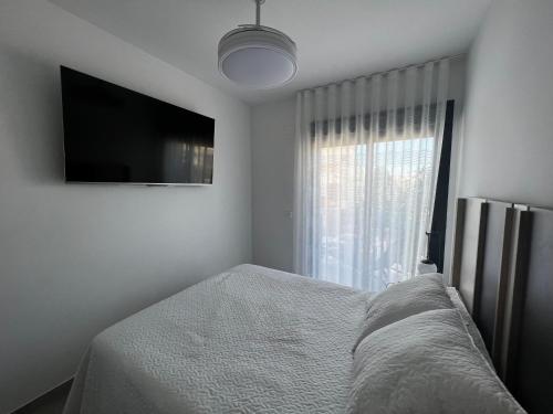 Cama o camas de una habitación en Elisa Apartment