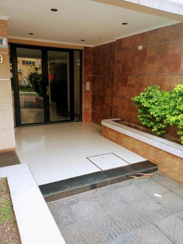 an entrance to a building with a glass door at TempoExtra in Corrientes