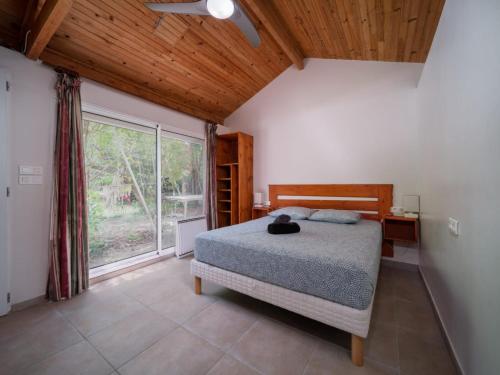 Postel nebo postele na pokoji v ubytování Appartements tout équipés climatisés Piscine et Jardin