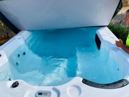 a bath tub with a polar bear in it at Sandalwood Downs Fabulous Farm Stay TOODYAY in Toodyay