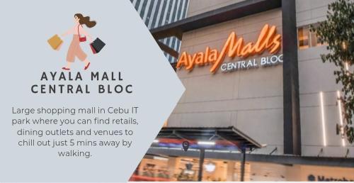 ein Schild für einen Mall Central Blog vor einem Gebäude in der Unterkunft Cebu City Scape at Cebu IT Park in Cebu City