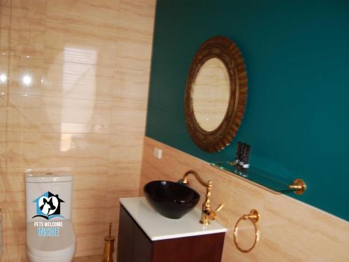 a bathroom with a black sink and a mirror at Unique 2Bed Home 100M to Beach in Encounter Bay