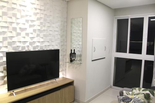 TV a/nebo společenská místnost v ubytování Quarto em Estância Velha