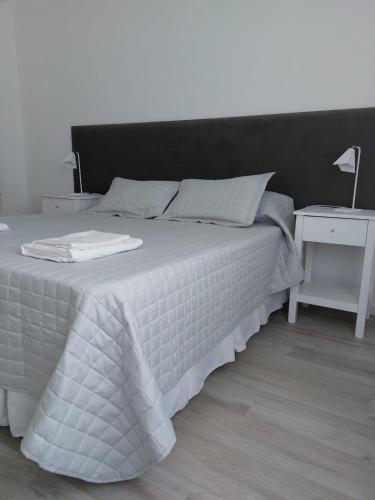 Letto o letti in una camera di Don Quijote Tandil